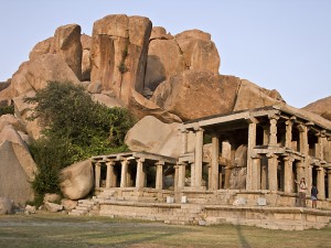 Giant boulders loom over a Hampi temple.