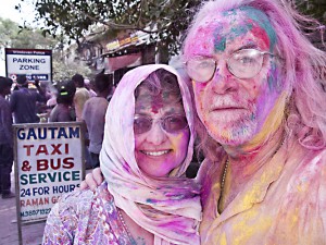 Covered in colored powder during Holi festivities in Vrindavan, India.