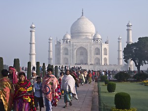 People crowd in to visit the Taj Mahal.